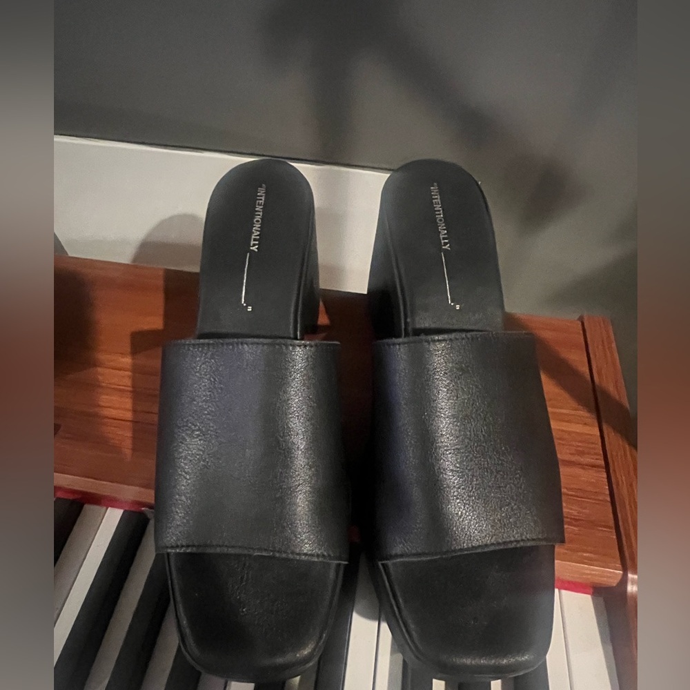 Intentionally Blank mules worn once in almost new condition.